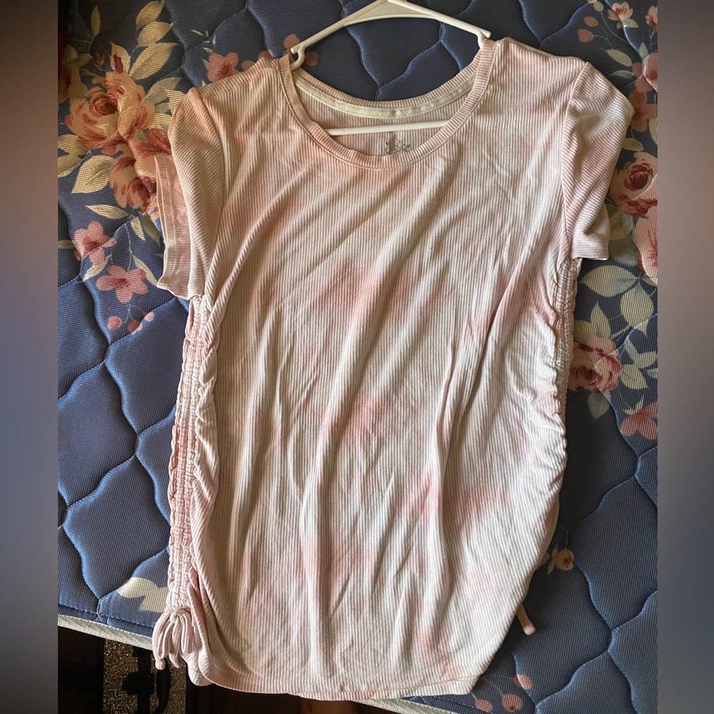 Light pink top from justice. It’s a 18/20 but fits small.